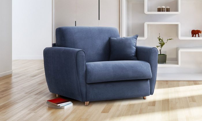 Fauteuil convertible 1 place en daim bleu marine avec passepoil de la même couleur. Il est fermé avec un coussin bleu marine.